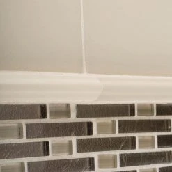 Sphynx Beige 12.125 in. x 10.75 in. Interlocking Glossy Glass Mosaic Tile (9.05 sq. ft./Case) by Jeffrey Court -Tile Elegant Shop beige jeffrey court glass tile 99569 a0 1000