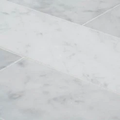Italian White Carrara 4 in. x 16 in. Honed Marble Wall and Floor Tile (8 sq. ft./Case) by Jeffrey Court 8 Italian White Carrara 4 in. x 16 in. Honed Marble Wall and Floor Tile (8 sq. ft./Case) by Jeffrey Court -Tile Elegant Shop white jeffrey court marble tile 95349 1d 1000